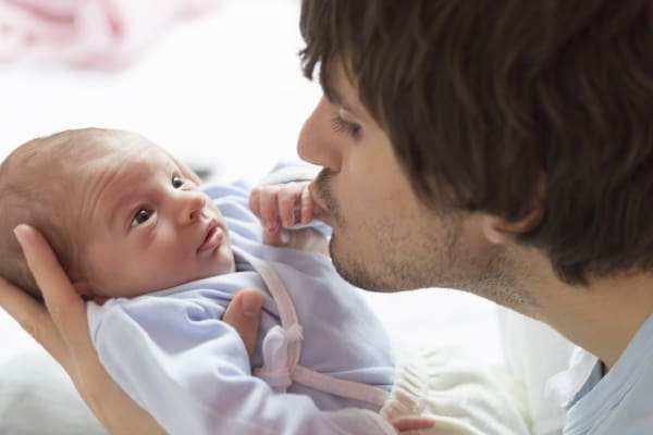 Mixed Race Young Family with Newborn Baby