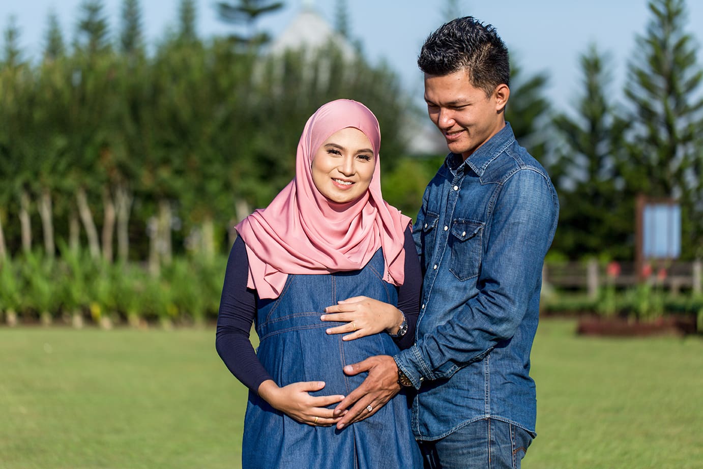 Young couple pregnant women with husband